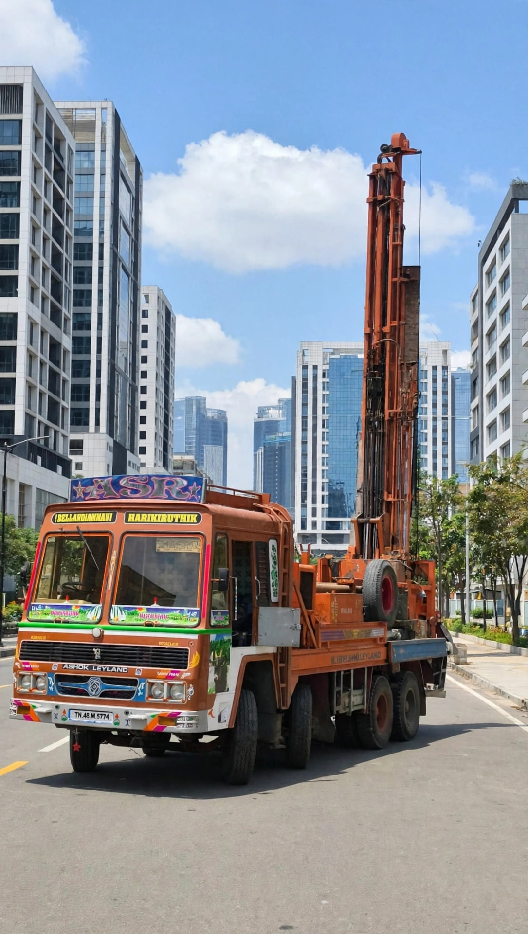 Shiv Shakti drilling rig truck moving through the city to a site