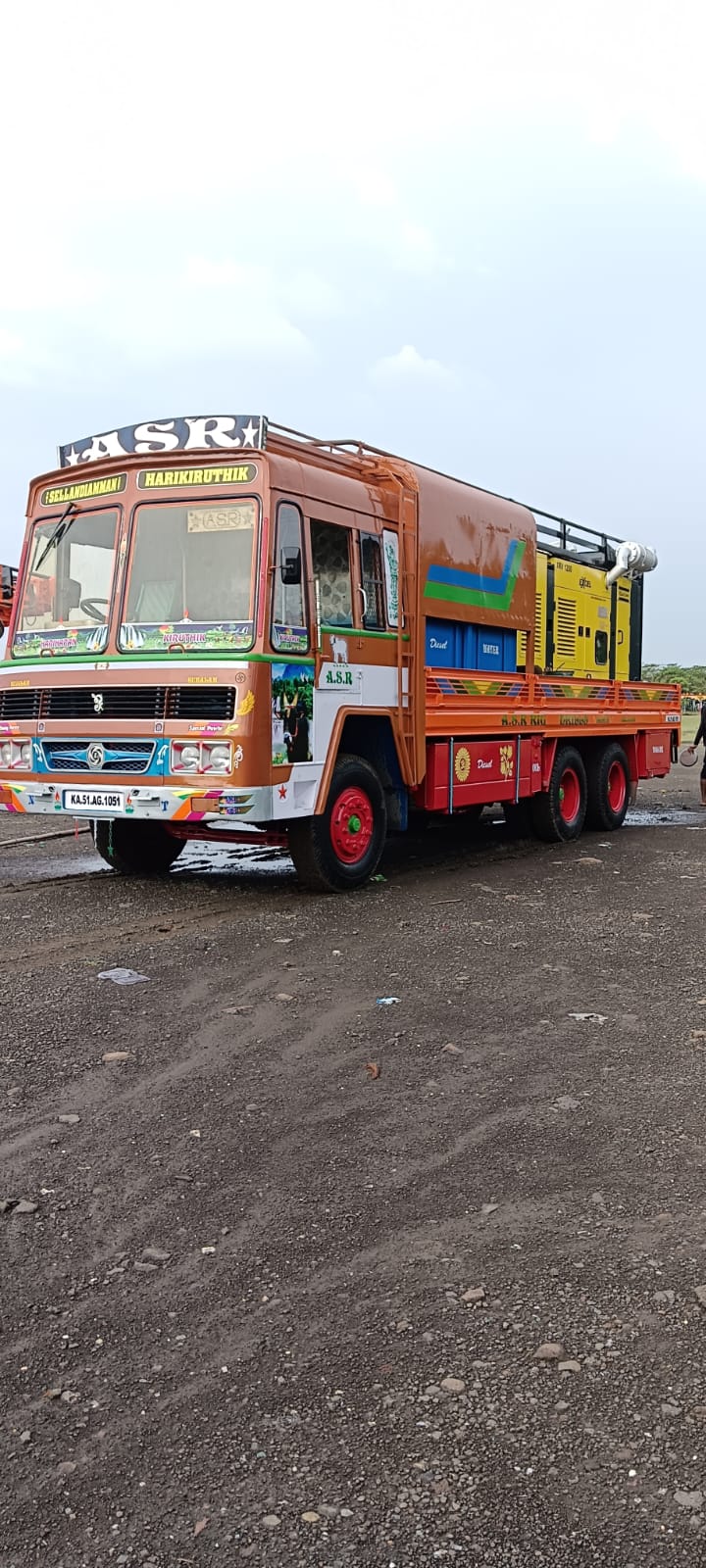 Borewell compressor and drilling rods on an Indore site